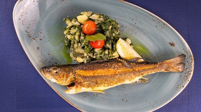 Grilled sea bass with boiled Swiss chard and potatoes